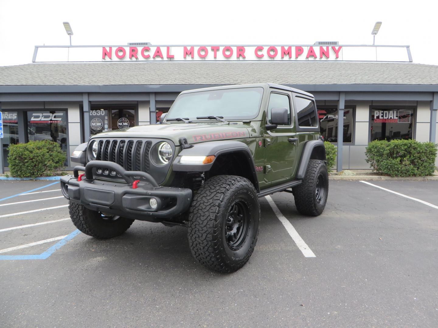 2021 Sarge Green /BLACK Jeep Wrangler Rubicon (1C4HJXCN4MW) with an 2.0L L4 DOHC 16V TURBO engine, 6A transmission, located at 2630 Grass Valley Highway, Auburn, CA, 95603, (530) 508-5100, 38.937893, -121.095482 - Rubicon featuring a Mopar suspension system, Fox shocks, 17" Fuel Wheels, BFG KO2 tires, Maxximus 3 front bumper stinger, Dual exhaust, Bolt hitch lock, Mopar HD tailgate hinge, and a custom cargo platform. - Photo#0